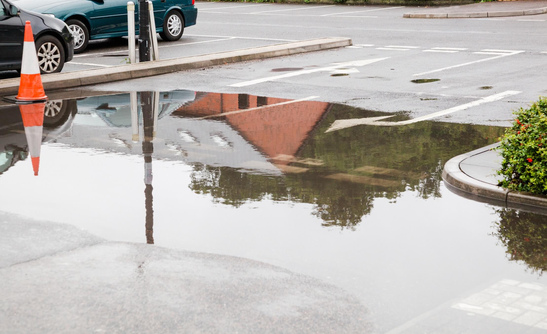 rain water flood in supermarket car park